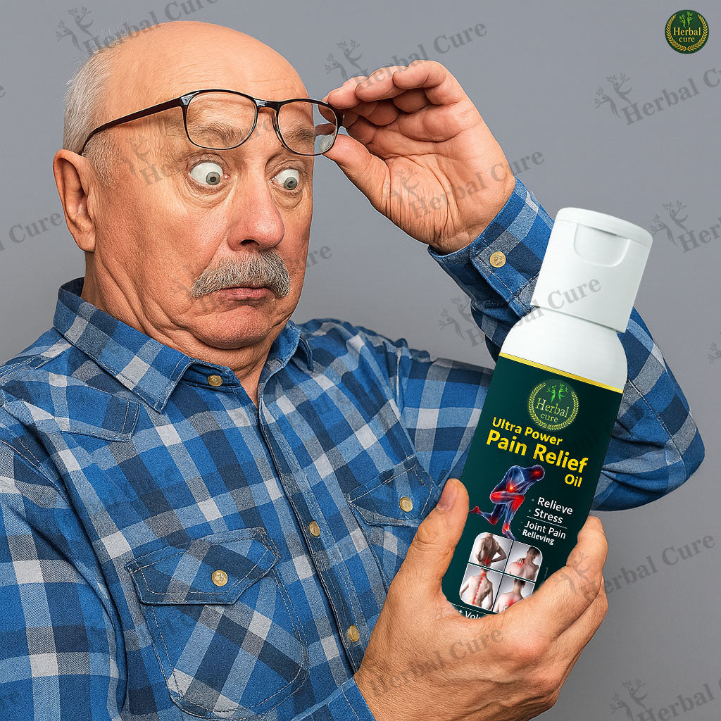 Man holding a bottle of Herbal Cure Ultra Power Pain Relief Oil 